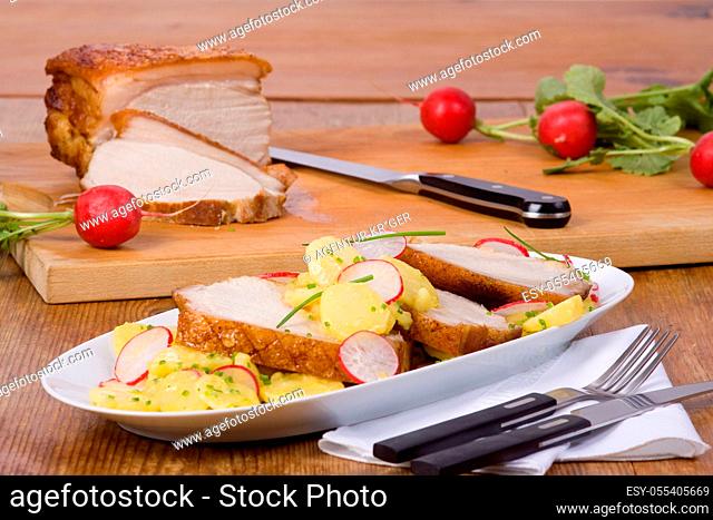 potato salad, roast pork