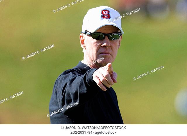 Oct 22, 2011; Charlottesville VA, USA; North Carolina State Wolfpack head coach Tom O'Brien directs his team during warm ups before the game against the...