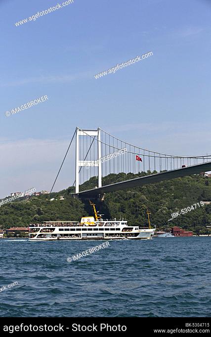 Ferry and Fatih Sultan Mehmet Bridge on the Bosphorus, Istanbul, Turkey, Asia
