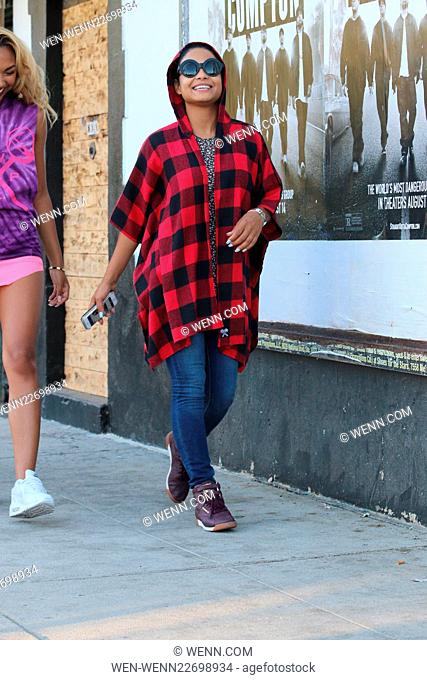 Christina Milian out and about in West Hollywood wearing a black and red checked coat Featuring: Christina Milian Where: Los Angeles, California