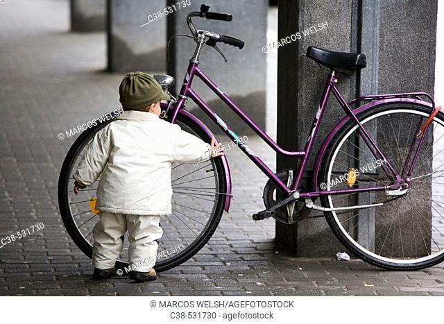 Boy Discovers a Bicycle in Maribor, Slovenia