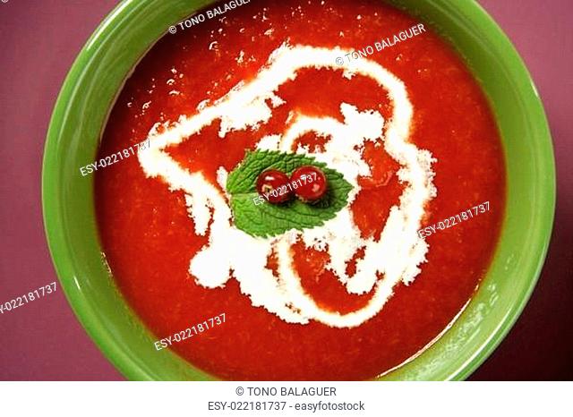 Tomato soup with basil and redcurrant