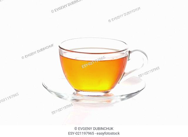 Tea in glass cup isolated on white