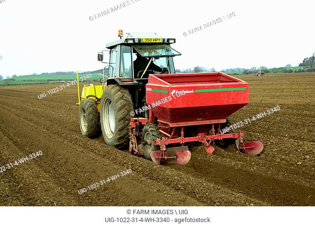 Planting potatoes and preparing seedbed, Northumberland. (Photo by: Wayne Hutchinson/Farm Images/UIG)