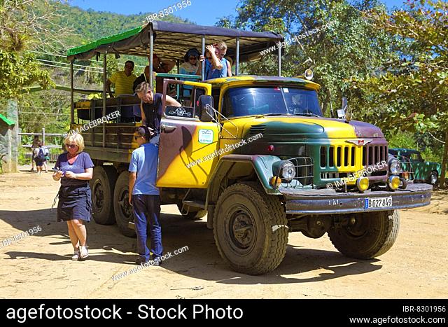 Truck, lorry, three-axle, all-terrain, transports group of tourists to Collantes Heights, Gran Parque Natural Topes de Collantes, nature reserve