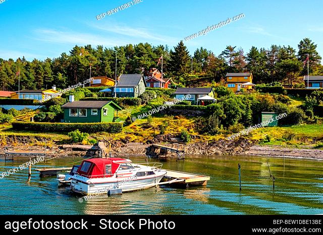 Oslo, Ostlandet / Norway - 2019/09/02: Panoramic view of Lindoya island on Oslofjord harbor with Lindoya Vest marina and summer cabin houses at shoreline in...