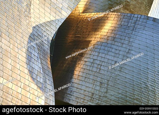 Guggenheim Museum Bilbao, detail of titan facade at sunset, museum of modern and contemporary art , architect Frank Gehry , Bilbao, Basque Country, Spain