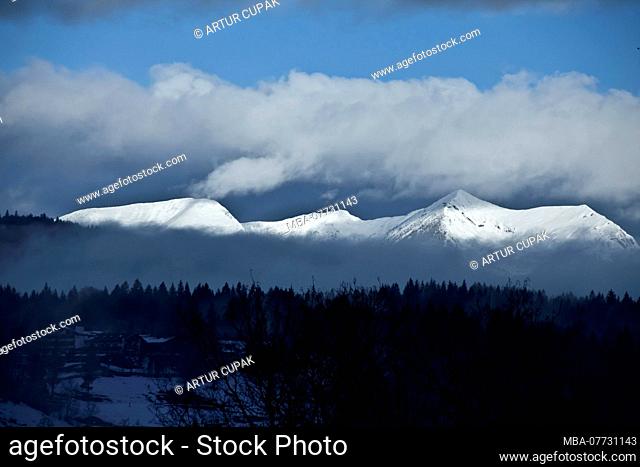 View on Estergebirge mountain range with Krottenkopf and Bishop mountains in winter, Upper Bavaria, Bavaria, Germany
