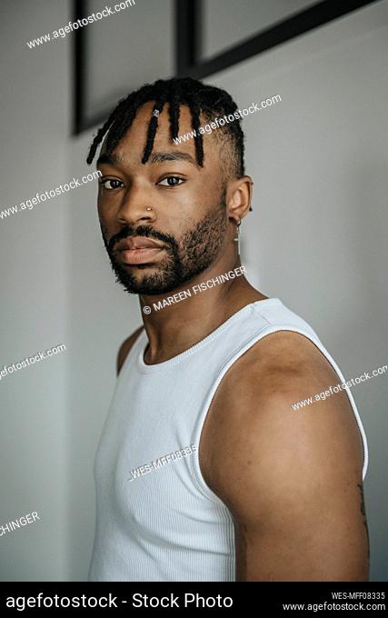 Young bearded man with locs hairstyle