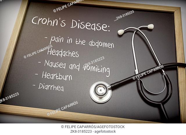 Crohn's disease can have these symptoms diarrhea, Headaches, Heartburn, Nausea and vomiting, Pain in the abdomen, Written on a blackboard next to a stethoscope