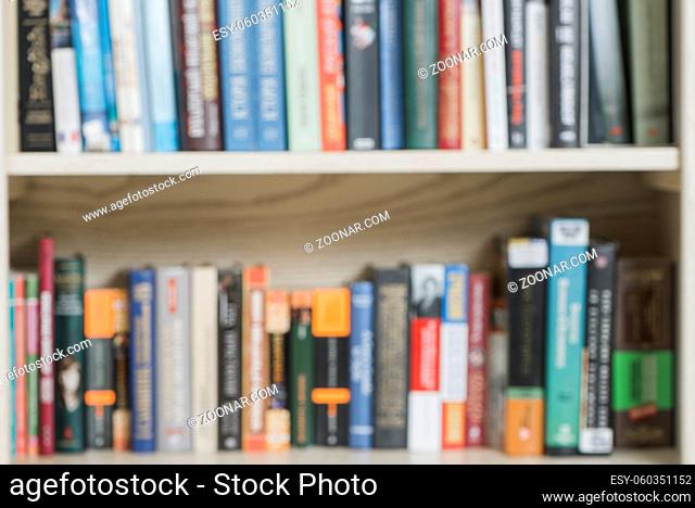blurred volumes bookshelf