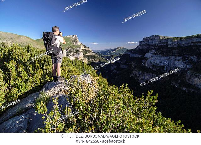Photographer in Ordesa & Monte Perdido National Park, Huesca, Aragon, Spain Pyrenees