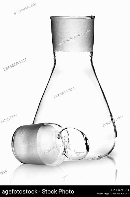 Laboratory flask with ground glass stopper near isolated on white background