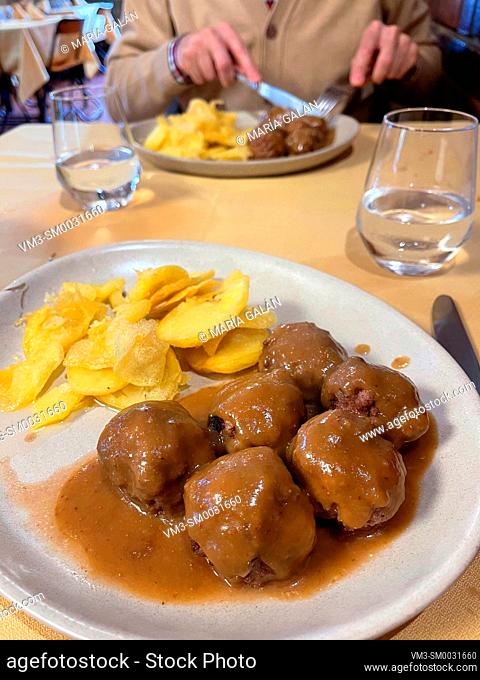 Meatballs with fried potatoes. Spain