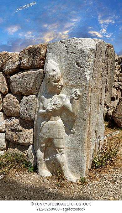Picture & image of the Hittite Relief sculpture of the God of War of the Kings Gate. Hattusa ( Hattusas) late Anatolian Bronze Age capital of the Hittite Empire