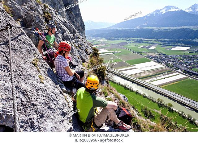 Climbers climbing the Kaiser Max Climbing Route of Martinswand beside Innsbruck, overlooking the Inn Valley, North Tyrol, Tyrol, Austria, Europe
