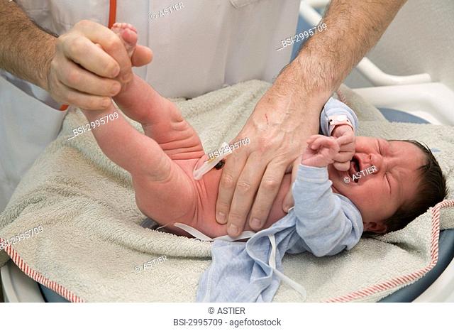 Photo essay at the maternity of Saint-Vincent de Paul hospital, Lille, France. Examination of the newborn baby by the pediatrician on the third day after the...