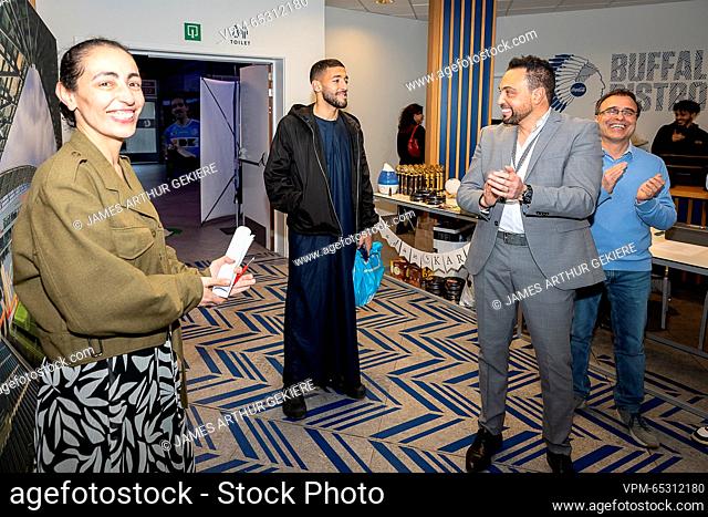 Gent's Tarik Tissoudali and Gent imam Khalid Benhaddou pictured during a charity iftar in favor of earthquake victims in Syria and Turkey