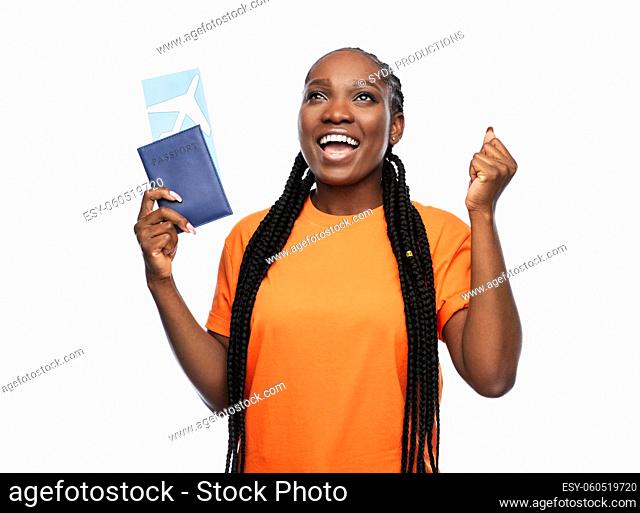 happy woman with passport and air ticket