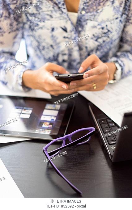 Young woman working in office