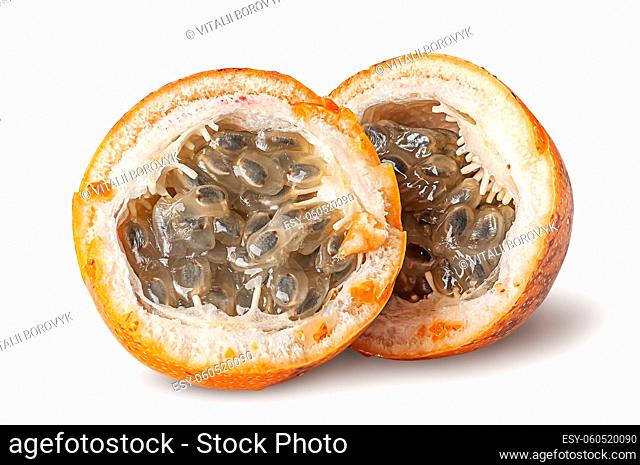 Two halves of tamarillo isolated on white background