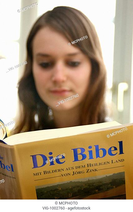 Young woman reads the Bible - 16/09/2008