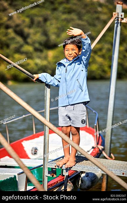 Child 5-10 years on the jetty, Zumaia, Gipuzkoa, Basque Country, Spain