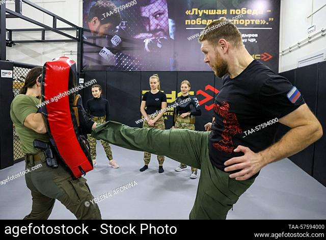 RUSSIA, GUDERMES - FEBRUARY 27, 2023: An instructor and students are seen during a training session of the ""Female Bodyguard"" close protection course at...