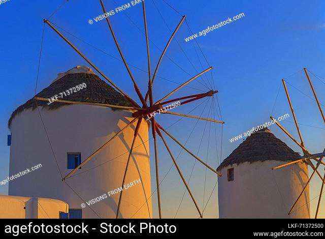 Windmills Kato Mili at sunset, Mykonos Town, Mykonos, Cyclades Islands, Greece