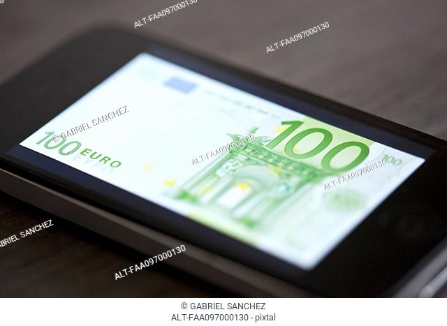 Smartphone displaying image of one-hundred euro banknote