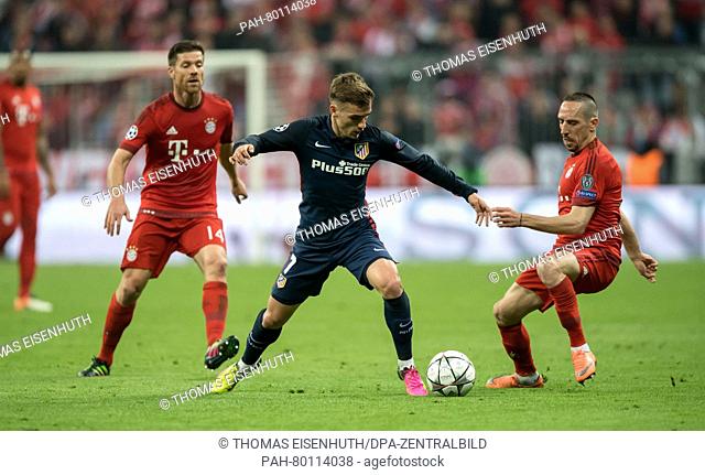 Bayern Munich's    Franck Ribery (r) and Madrid's Antoine Griezmann in action during the UEFA Champions League semi final soccer match FC Bayern Munich vs...