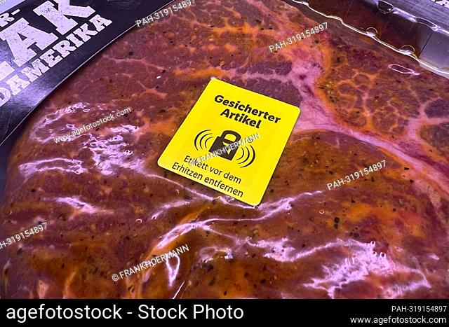 The SECURED ARTICLE label on a shrink-wrapped beef steak at the LIDL discounter indicates that the product is protected against theft