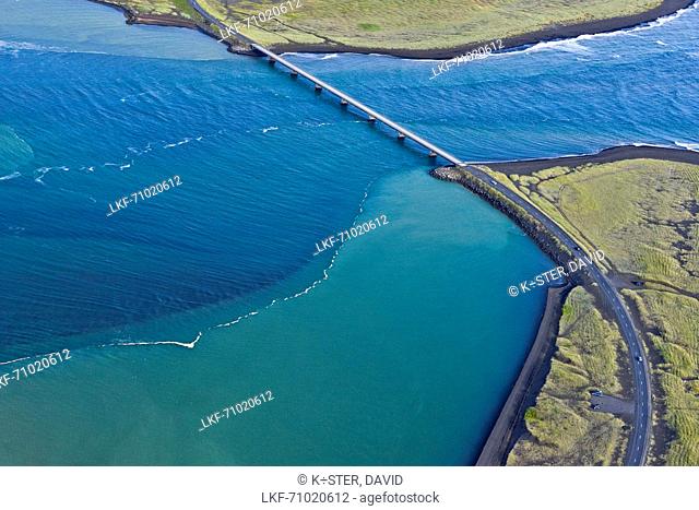 aerial view of bridge Ëseyrarbr· over river Olfussa, which is flowing into Atlantic Ocean, near Eyrarbakki, South Iceland, Iceland, Europe