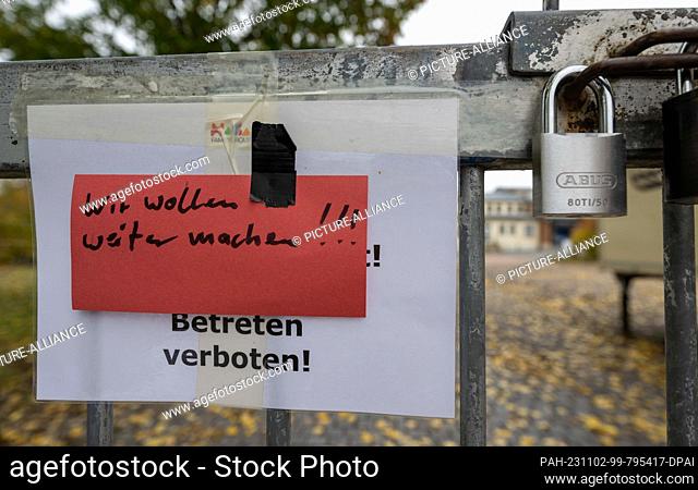 02 November 2023, Saxony-Anhalt, Eisleben: ""We want to go on!!!"" is written on a note at the factory gate of the toy and furniture manufacturer Haba in...