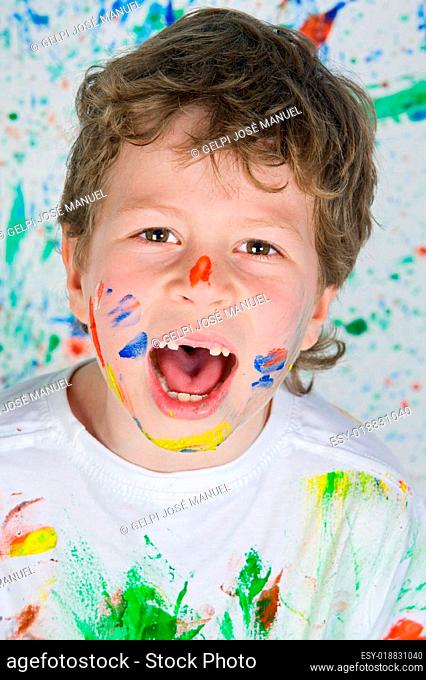 Boy playing with painting