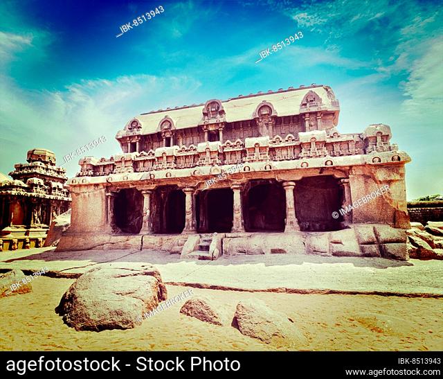 Vintage retro hipster style travel image of Five Rathas, ancient Hindu monolithic Indian rock-cut architecture. Mahabalipuram, Tamil Nadu, South India