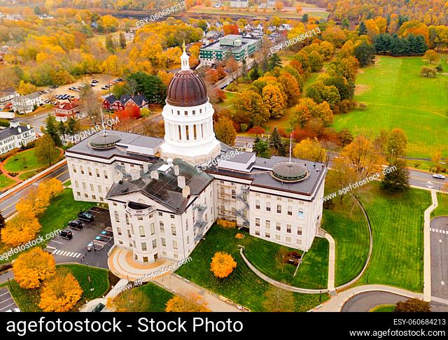 Close to the peak of fall color in the leaves at the State House of Main in Augusta USA