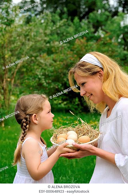 Mother and daughter having Easter time