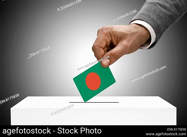 Black male holding flag. Voting concept - Bangladesh