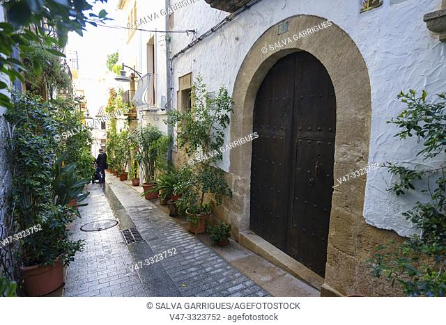 Facade of an old house on a street in the old town of Denia, Alicante, Comunitat Valenciana, Spain
