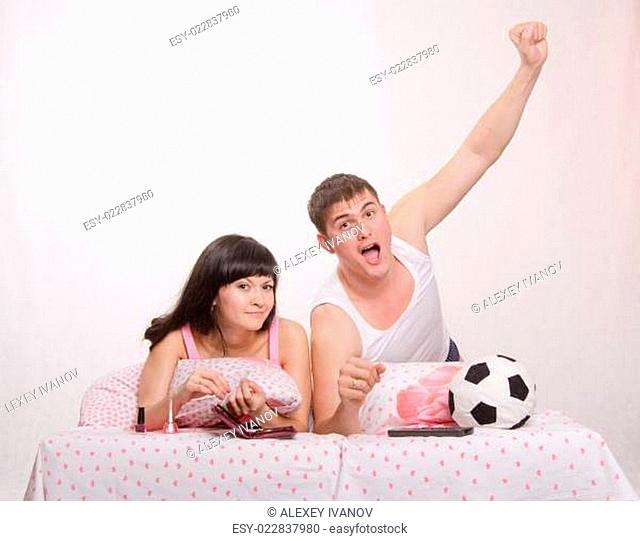 Celebrates after scoring husband, wife watch soccer