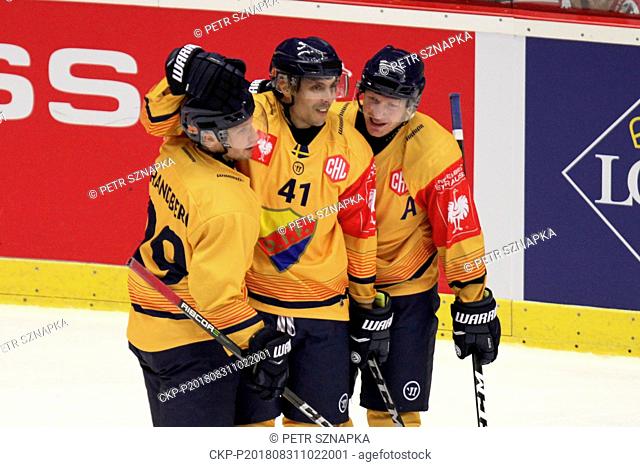 (L-R) Sebastian Strandberg, Daniel Widing and Jacob Josefsson of Djurgaarden celebrate a goal during the Ice-Hockey Champions League group E game Ocelari Trinec...
