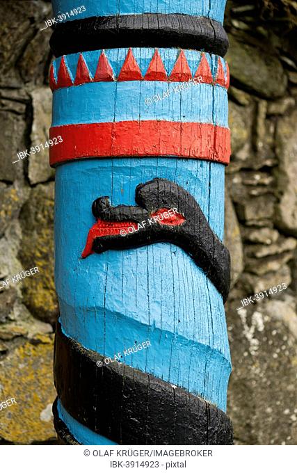 Black Midgard Serpent or World Serpent, carved wooden pillar, Kirkjubøur, Streymoy, Faroe Islands, Denmark