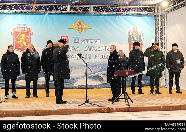 RUSSIA, ARKHANGELSK REGION - DECEMBER 11, 2023: Russia's President Vladimir Putin and Nikolai Yevmenov (R-L front), commander-in-chief of the Russian Navy