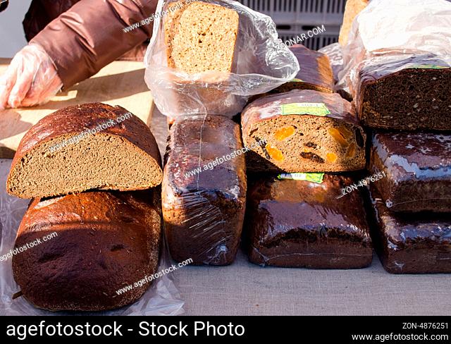 healthy ecologic natural bread loaf sell in outdoor street market fair. diet nutrition food