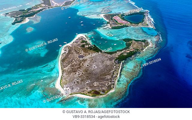 Aerial view Francisky Island surrounded by Turquoise waters in Caribbean Sea in Los Roques Venezuela