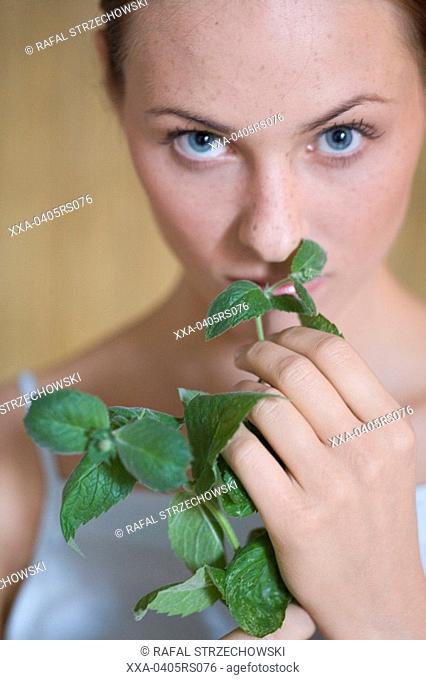 beauty woman with fresh herbs