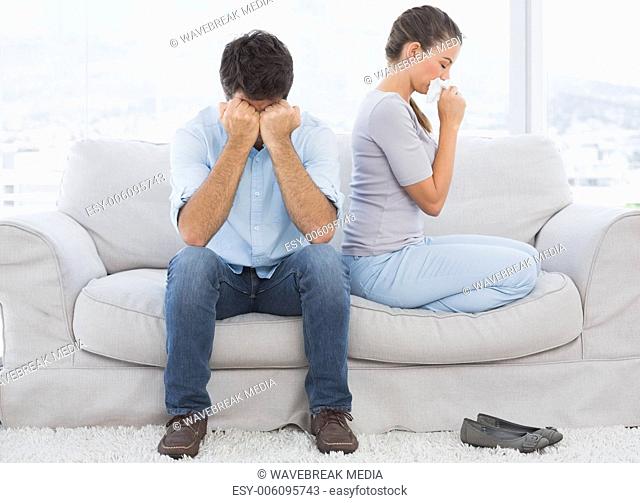 Couple on the couch after an argument