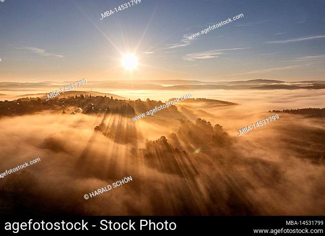 Germany, Thuringia, Koenigsee, Horba, village rises on a mountain from a sea of fog, overview, mountains, valleys, valley fog, sun, aerial photo, back light