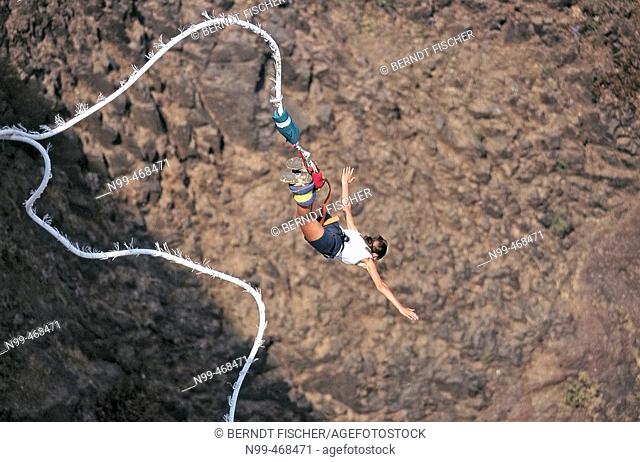 Woman doing a bungee jump, view from above, Victoria Falls, Zimbabwe